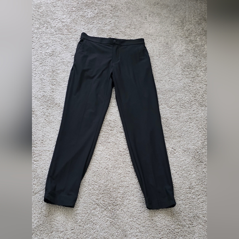 Black straight-leg pants by Van Heusen